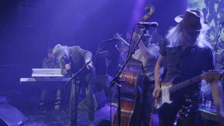 Elokuvajuliste: TUOMARI NURMIO - 13 KYLMÄÄ LAULUA (2026)