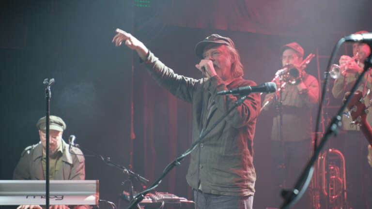 Elokuvajuliste: TUOMARI NURMIO - 13 KYLMÄÄ LAULUA (2026)